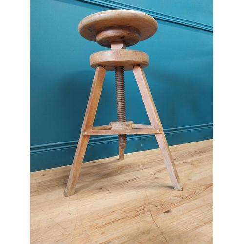 29 - Early 20th C. pine revolving artist's stool of large proportions. {72 cm H x 51 cm Dia.}.