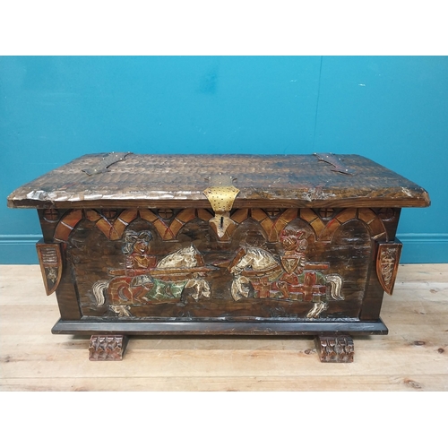 294 - Unusual carved and painted pine trunk with jousting horses and shield decoration in front and side p... 