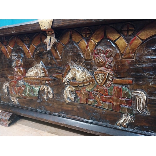 294 - Unusual carved and painted pine trunk with jousting horses and shield decoration in front and side p... 