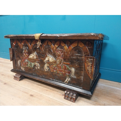 294 - Unusual carved and painted pine trunk with jousting horses and shield decoration in front and side p... 