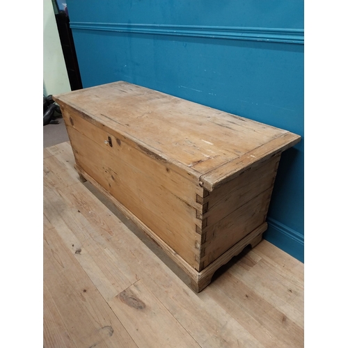 299 - 19th C. stripped pine lidded trunk. {64 cm H x 140 cm W x 54 cm D}.