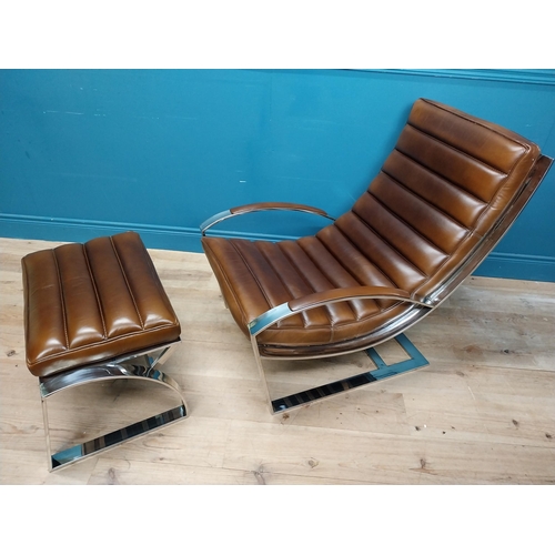 305 - Exceptional quality leather and chrome lounging armchair and matching footstool in the Art Deco styl... 