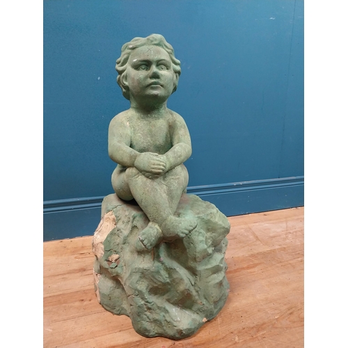 308 - Resin model of Angel seated on rock. {64 cm H x 49 cm W x 49 cm D}.