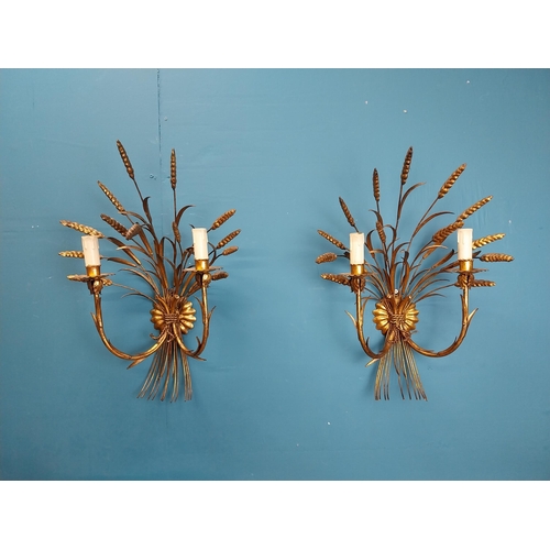 31 - Rare pair of gilded metal wheat sheaf two branch wall lights. {59 cm H x 38 cm W x 25 cm D}.