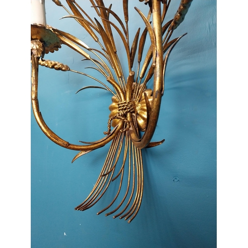 31 - Rare pair of gilded metal wheat sheaf two branch wall lights. {59 cm H x 38 cm W x 25 cm D}.