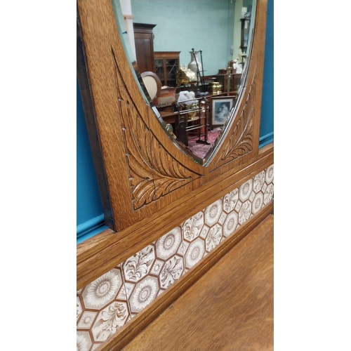 314 - Good quality Edwardian oak and brass hall stand with tiled panel raised on turned legs and platform ... 