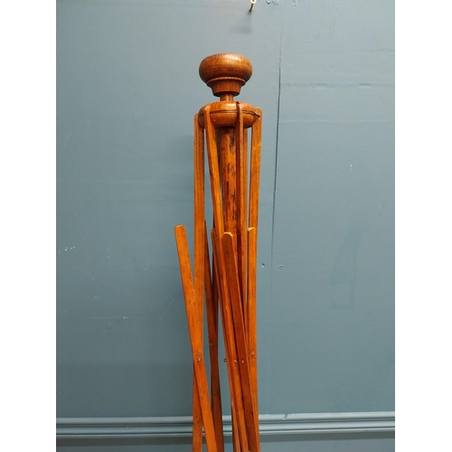 323 - Early 20th C. oak wool winder on cast iron base. {100 cm H x 17 cm W x 17 cm D}.