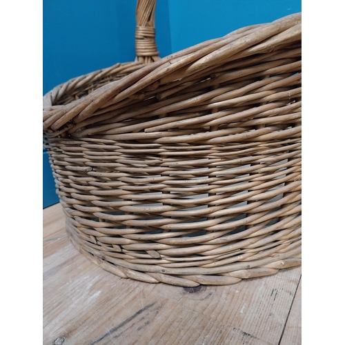 326 - Early 20th C. wicker basket. {57 cm H x 64 cm W  x 53 cm D}.