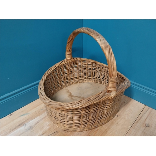 326 - Early 20th C. wicker basket. {57 cm H x 64 cm W  x 53 cm D}.