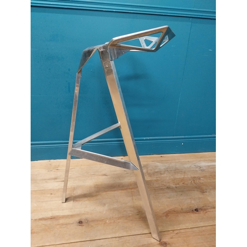 332 - Pair of designer chrome high stools. {84 cm H x 56 cm W X 53 cm D}.