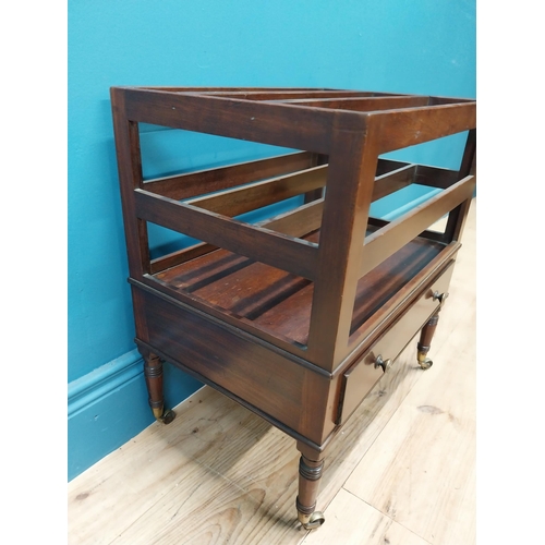 337 - Georgian mahogany canterbury raised on four turned legs with brass casters and single drawer. {51 cm... 