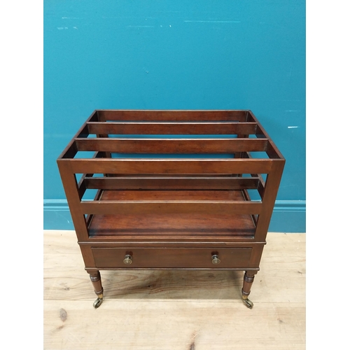 337 - Georgian mahogany canterbury raised on four turned legs with brass casters and single drawer. {51 cm... 