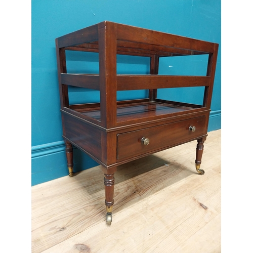 337 - Georgian mahogany canterbury raised on four turned legs with brass casters and single drawer. {51 cm... 