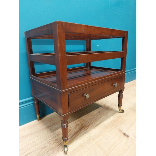 337 - Georgian mahogany canterbury raised on four turned legs with brass casters and single drawer. {51 cm... 