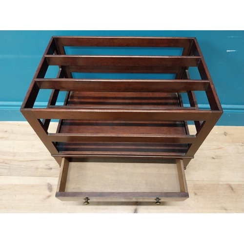 337 - Georgian mahogany canterbury raised on four turned legs with brass casters and single drawer. {51 cm... 