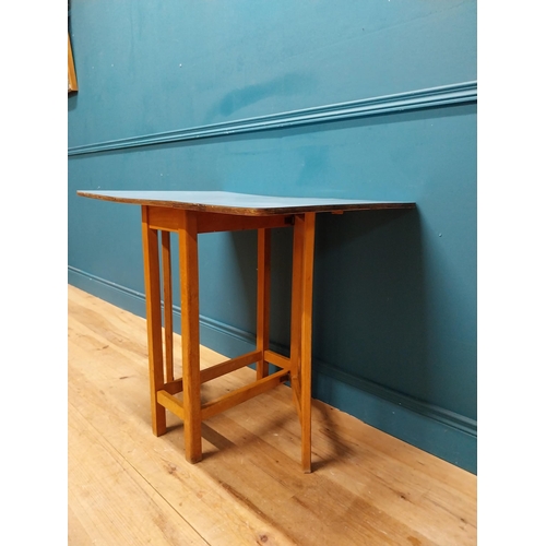 339 - Retro kitchen table with drop down sides and Formica top. {73 cm H x 61 cm W x 31 cm D}.