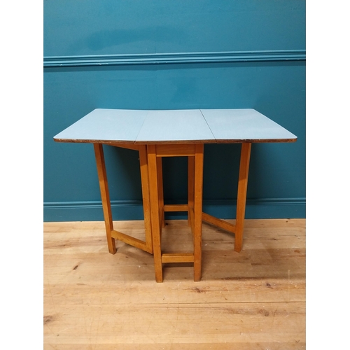 339 - Retro kitchen table with drop down sides and Formica top. {73 cm H x 61 cm W x 31 cm D}.