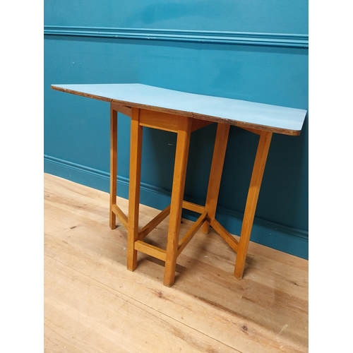 339 - Retro kitchen table with drop down sides and Formica top. {73 cm H x 61 cm W x 31 cm D}.