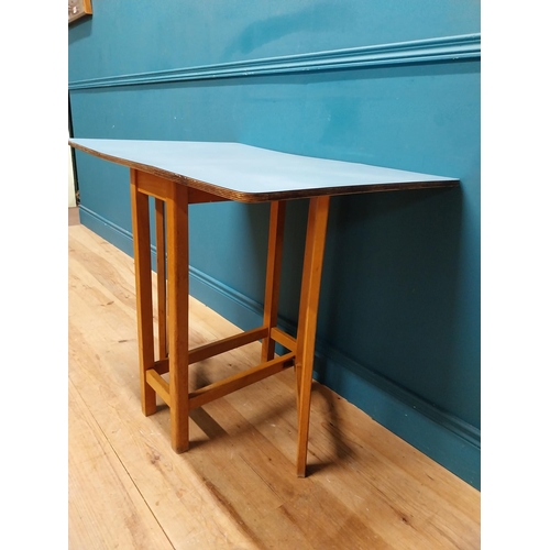 339 - Retro kitchen table with drop down sides and Formica top. {73 cm H x 61 cm W x 31 cm D}.