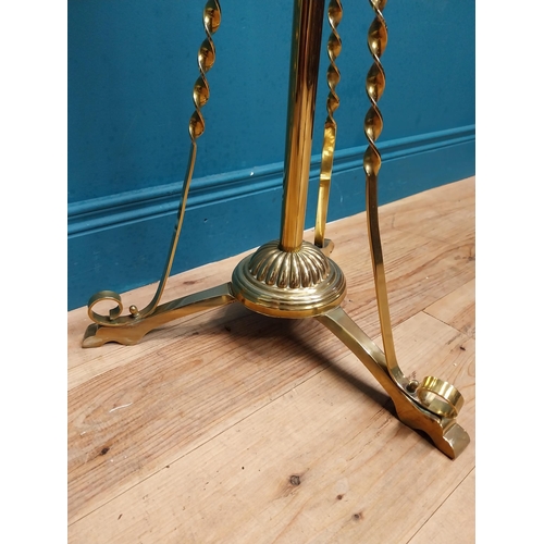 340 - Edwardian brass standard lamp with glass shade on tripod base. {160 cm H x 50 cm Dia.}.