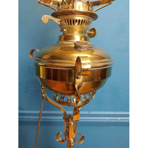 340 - Edwardian brass standard lamp with glass shade on tripod base. {160 cm H x 50 cm Dia.}.