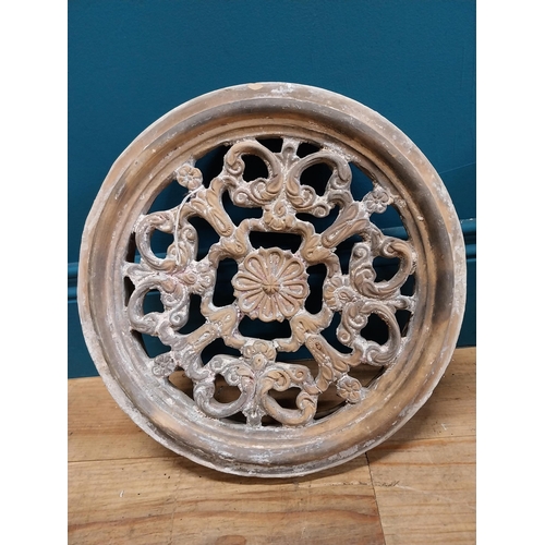 351 - Pair of 19th C. decorative terracotta circular wall vents. {32 cm Dia. x 8 cm D}.