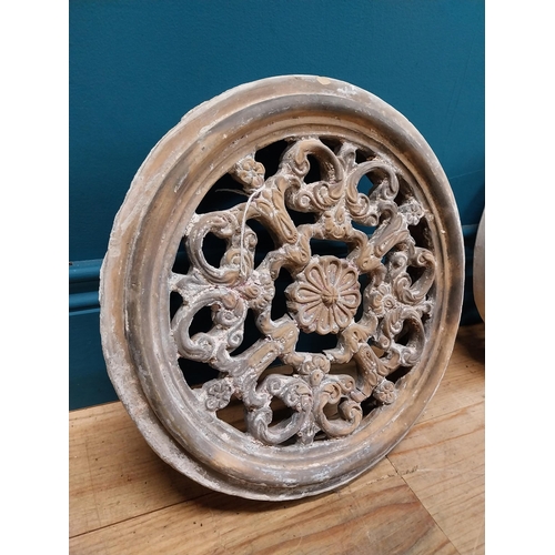 351 - Pair of 19th C. decorative terracotta circular wall vents. {32 cm Dia. x 8 cm D}.