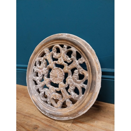 351 - Pair of 19th C. decorative terracotta circular wall vents. {32 cm Dia. x 8 cm D}.