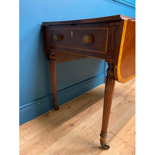 355 - Regency mahogany and satinwood drop leaf table. {72 cm H x 91 cm W x 60 cm D}.