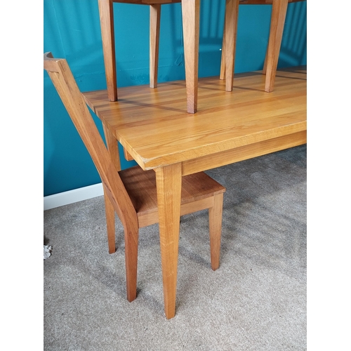 358 - Good quality oak kitchen table raised on square tapered legs with six matching chairs {Table 76 cm H... 