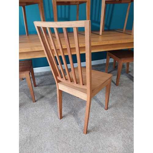 358 - Good quality oak kitchen table raised on square tapered legs with six matching chairs {Table 76 cm H... 