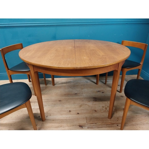 362 - Mid century teak dining table with pull out central leaf and four matching upholstered chairs. Table... 