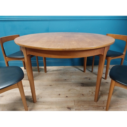 362 - Mid century teak dining table with pull out central leaf and four matching upholstered chairs. Table... 