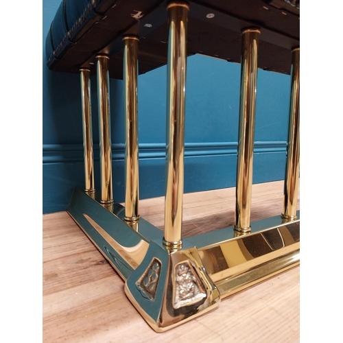 373 - Exceptional quality brass club fender with upholstered leather seating. {38 cm H x 142 cm W  x 43 cm... 