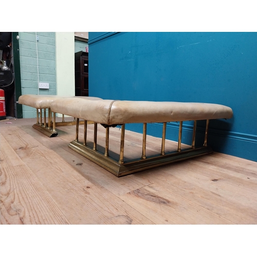 381 - Edwardian brass and upholstered club fender in two parts. {30 cm H x 140 cm W x 86 cm D}.