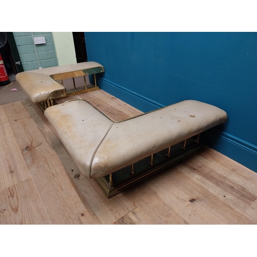 381 - Edwardian brass and upholstered club fender in two parts. {30 cm H x 140 cm W x 86 cm D}.