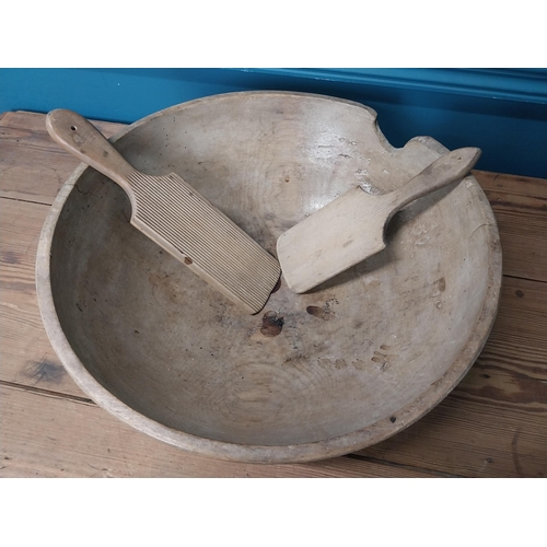 388 - 19th C. pine butter bowl with two pats. {13 cm H x 39 cm Dia>}.