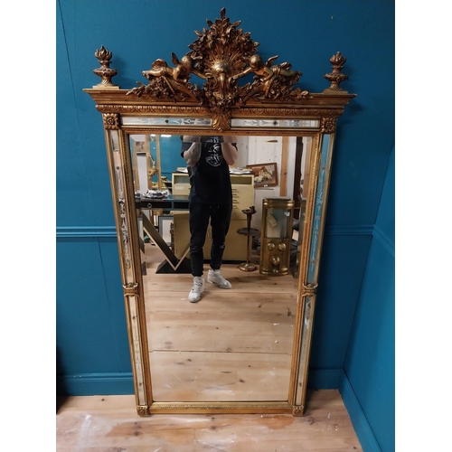 390 - 19th C. French gilt mirror with floral decoration and etched surrounds surmounted with cherubs. {180... 