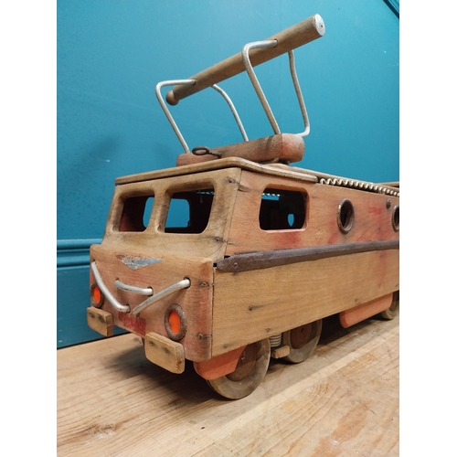 391 - 1950's Dejou wooden ride along toy in the form of a bus tram. {38 cm H x 70 cm W x 24 cm D}.