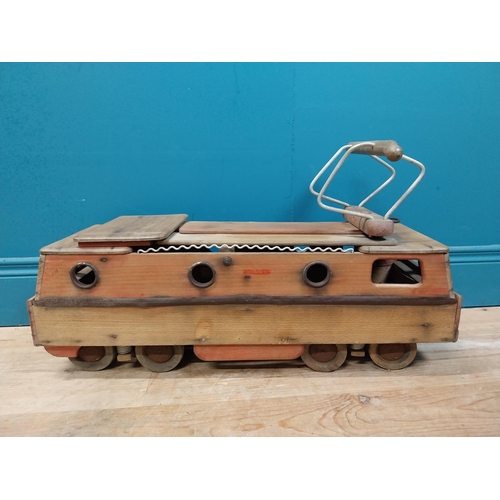 391 - 1950's Dejou wooden ride along toy in the form of a bus tram. {38 cm H x 70 cm W x 24 cm D}.