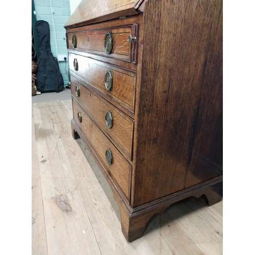 397 - Georgian oak bureau bookcase with fitted red velvet interior on bracket feet above two glazed doors.... 