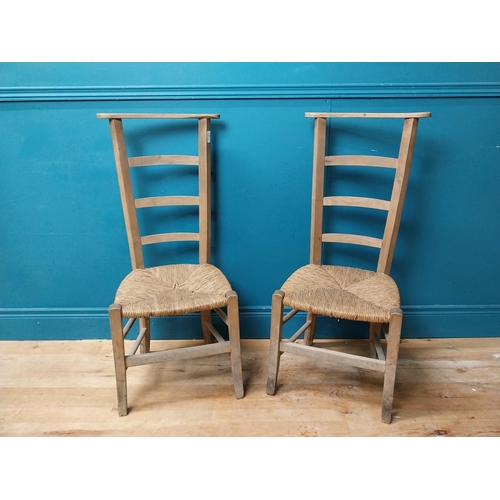 404 - Pair of pine sugan chairs. {92 cm H x 40 cm W x 38 cm W}.