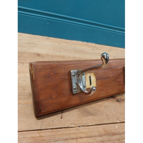 406 - Early 20th C. wooden wall mounted hat and coat rack with numbering 1 to 12. {14 cm H x 215 cm W x 11... 