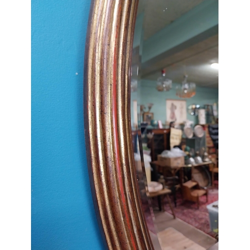 414 - Good quality oval giltwood wall mirror. {80 cm H x 57 cm W}.