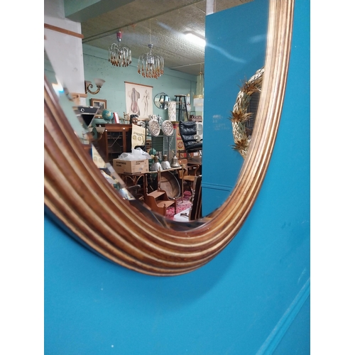 414 - Good quality oval giltwood wall mirror. {80 cm H x 57 cm W}.