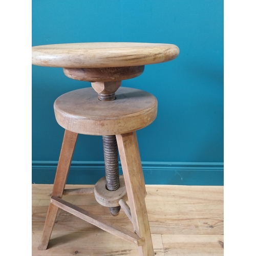 419 - Early 20th C. pine revolving artist's stool of large proportions. {72 cm H x 51 cm Dia.}.