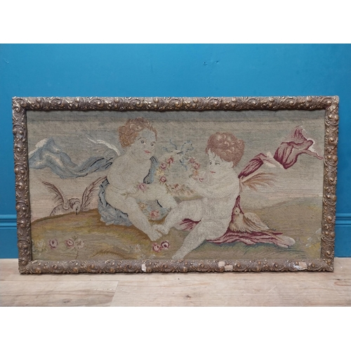 425 - 18th C. French tapestry depicting cherubs holding floral wreath mounted in carved giltwood frame. {5... 