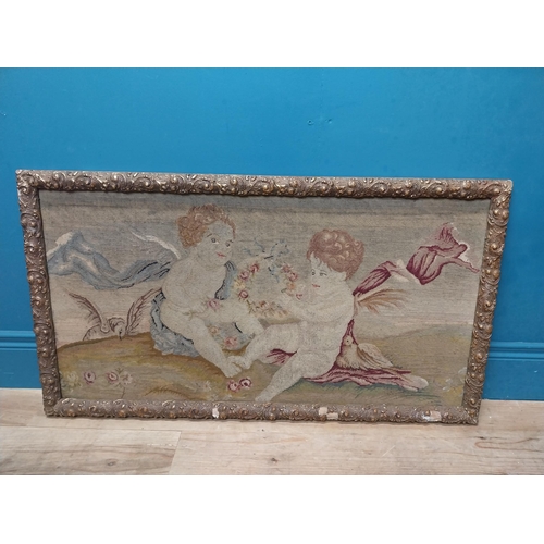 425 - 18th C. French tapestry depicting cherubs holding floral wreath mounted in carved giltwood frame. {5... 