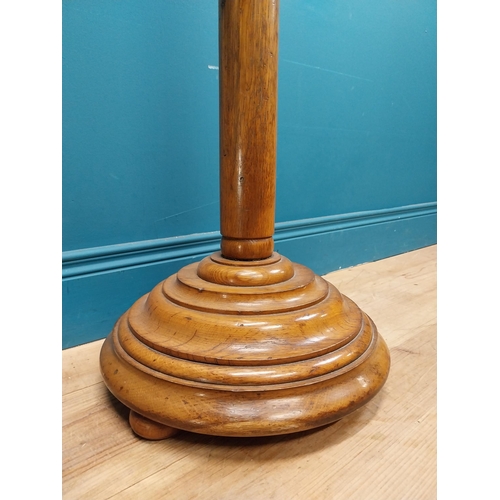 427 - Early 20th C. oak hat and coat stand. {195 cm H x 36 cm Dia.}.