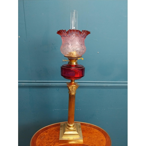 428 - 19th C. brass oil lamp with Corinthian column with ruby bowl and etched ruby glass shade. {84 cm H x... 